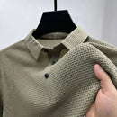The Wimbledon Performance Polo in khaki — lightweight stretch polo for men