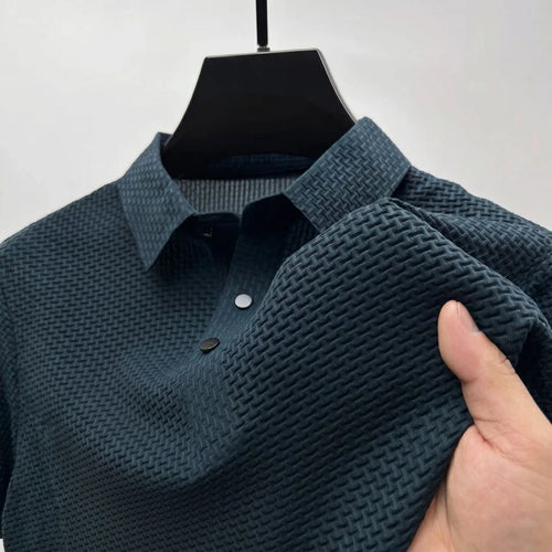 The Wimbledon Performance Polo in deep blue — tailored men's performance polo