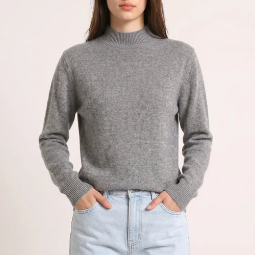 The Belgravia Merino Mock Neck — detail of the ribbed mock neck collar and cuffs